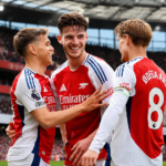 Arsenal F.C. players celebrating during a football match