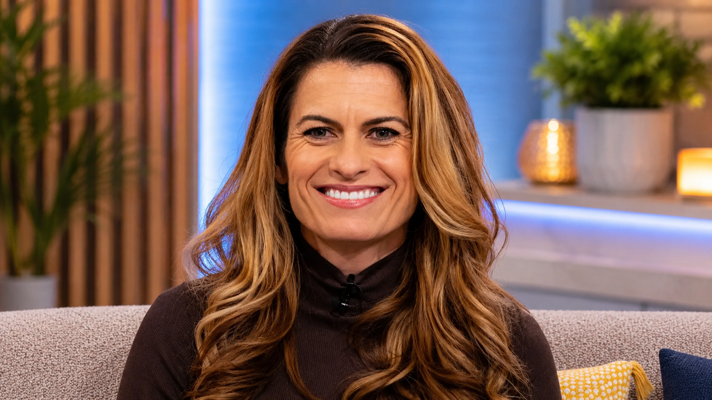 Karen Carney wife during a television interview discussing her football career